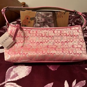 Pink Coach wristlet